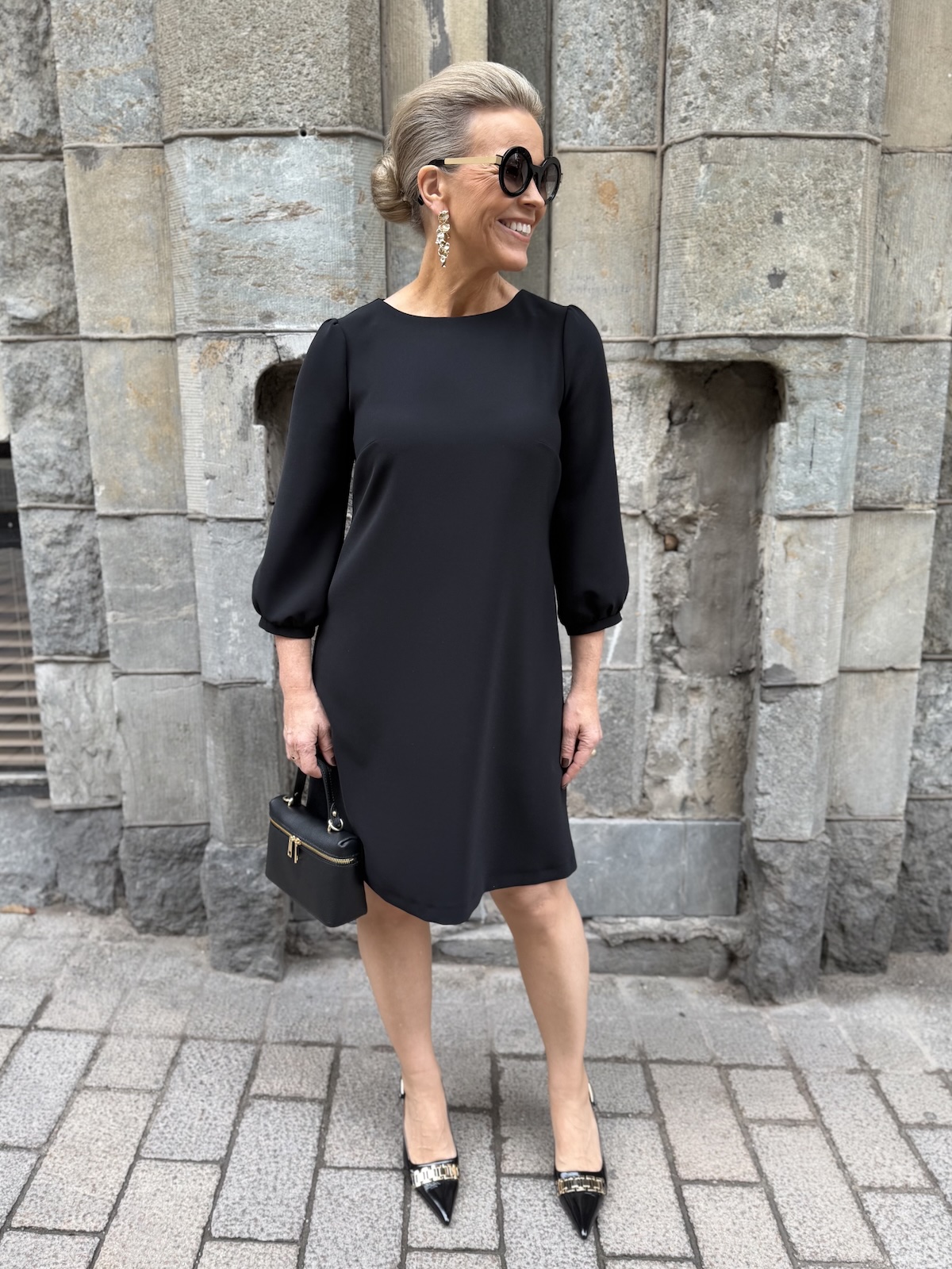 DW Olivia mekko; musta